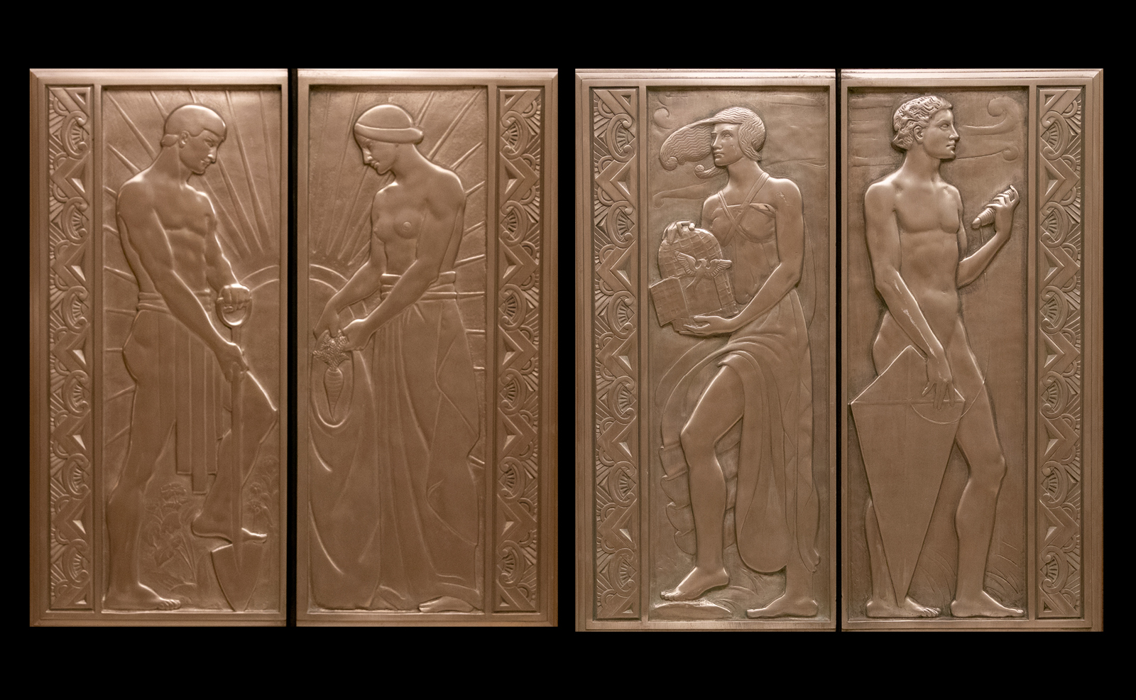 Image of a set of ornate, bronze elevator doors featuring male and female figures