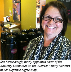 Sue Strausbaugh, newly appointed chair of the Advisory Committee on the Judicial Family Network, in her Defiance coffee shop.