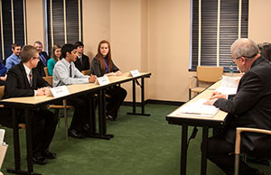 Students from Findlay High School answer questions from the judging panel. Students from Findlay High School answer questions from the judging panel.